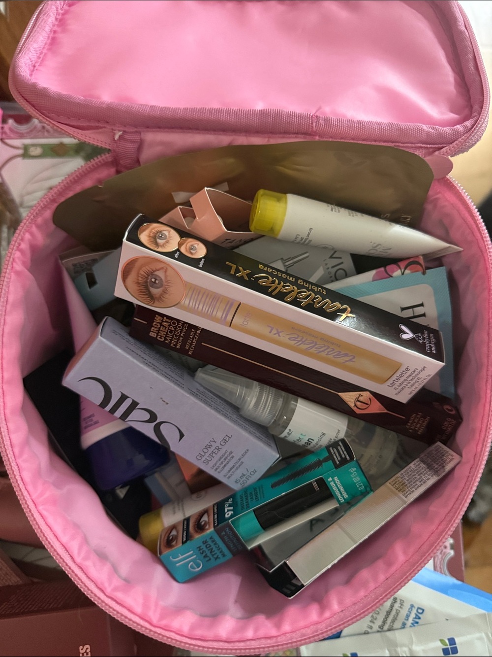 Assorted Women’s Makeup Set  in striped makeup bag